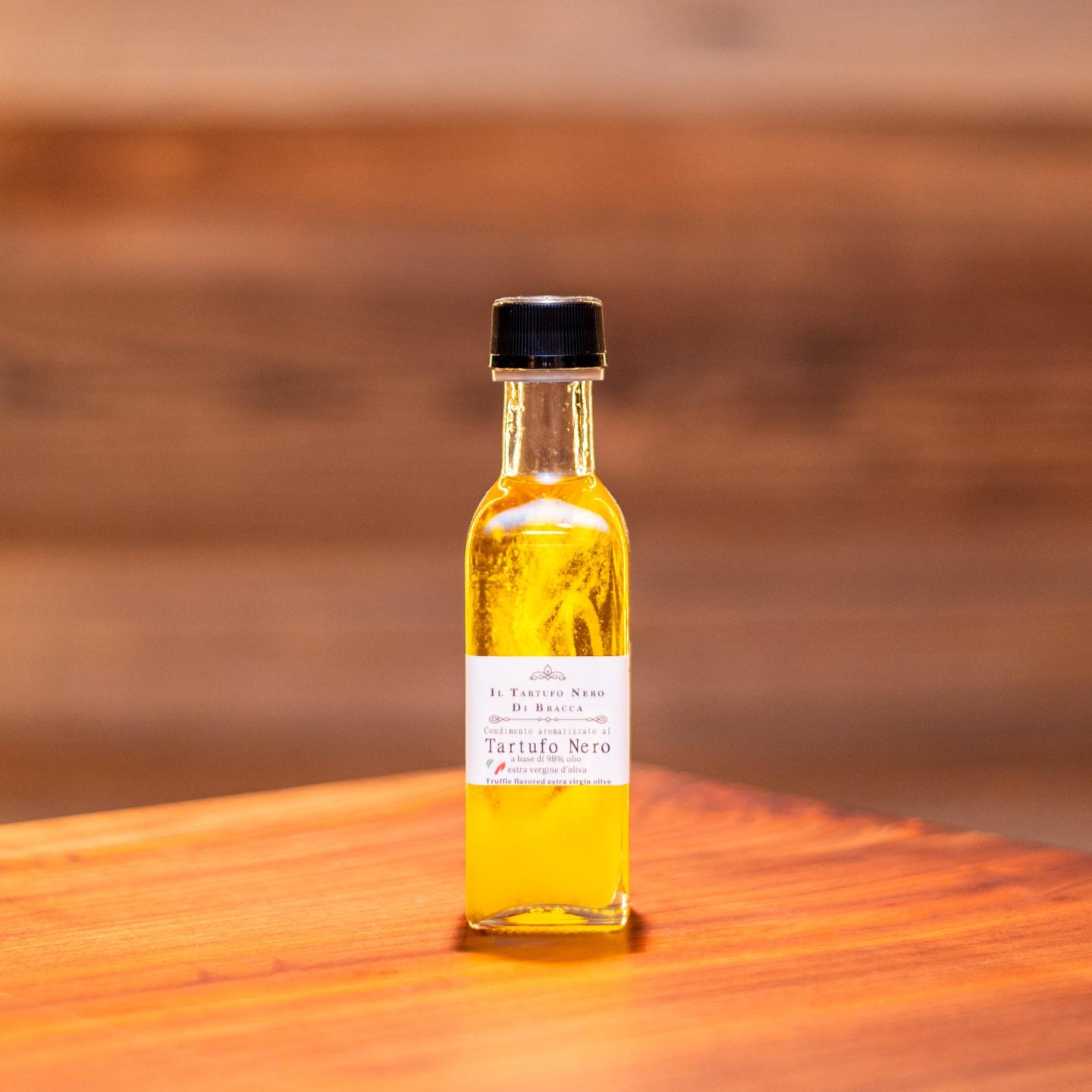 OLIO EXTRAVERGINE AL TARTUFO NERO